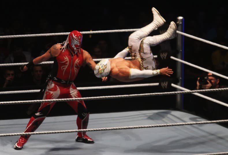 Rey Mysterio competes in the ring against Sin Cara during the WWE SmackDown World Tour at O2 World on November 2, 2012 in Hamburg, Germany. (Photo by Joern Pollex/Bongarts/Getty Images)