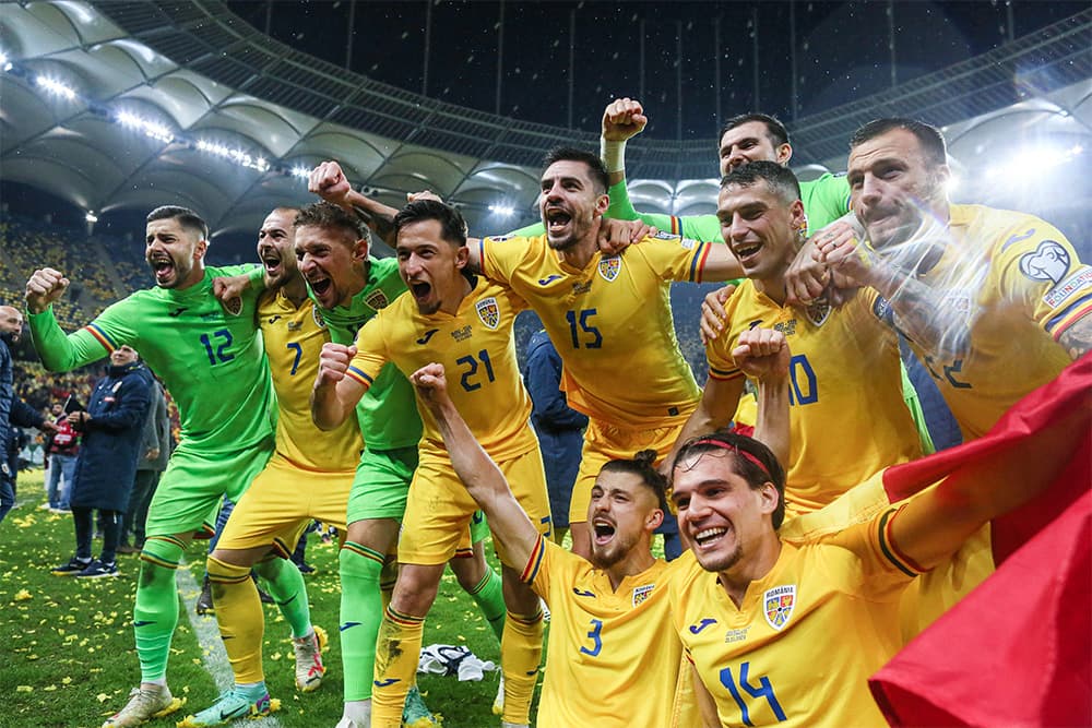 Romania celebrate on field