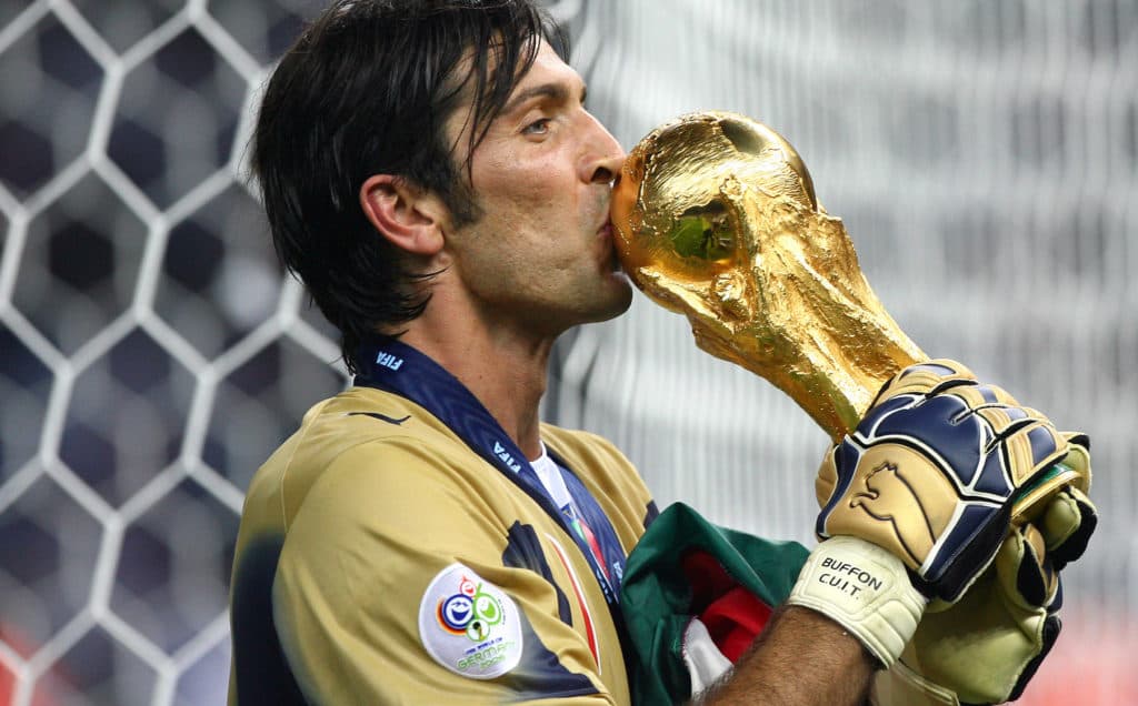 Gianluigi Buffon (ITA) celebrates with the trophy after the final of the 2006 FIFA World Cup between Italy and France. (Photo by Eddy LEMAISTRE/Corbis via Getty Images)