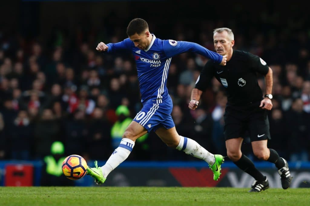 Chelsea's Belgian midfielder Eden Hazard runs with the ball plays during the English Premier League football match between Chelsea and Arsenal at Stamford Bridge in London on February 4, 2017. / AFP / Adrian DENNIS / RESTRICTED TO EDITORIAL USE. No use with unauthorized audio, video, data, fixture lists, club/league logos or 'live' services. Online in-match use limited to 75 images, no video emulation. No use in betting, games or single club/league/player publications. / (Photo credit should read ADRIAN DENNIS/AFP/Getty Images)