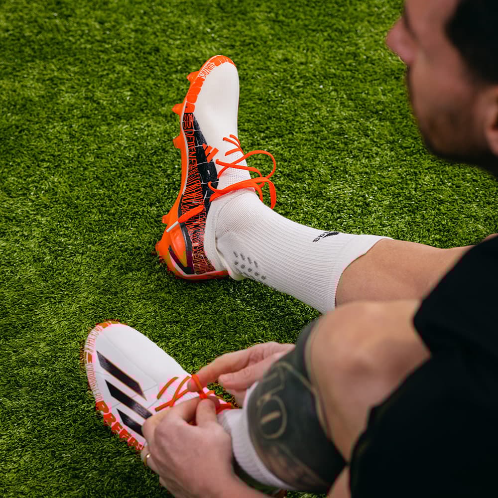 messi wearing adidas shoes