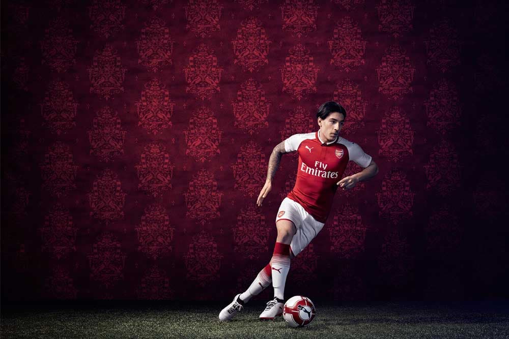 Hector Bellerin in the 2017-18 Arsenal PUMA home jersey