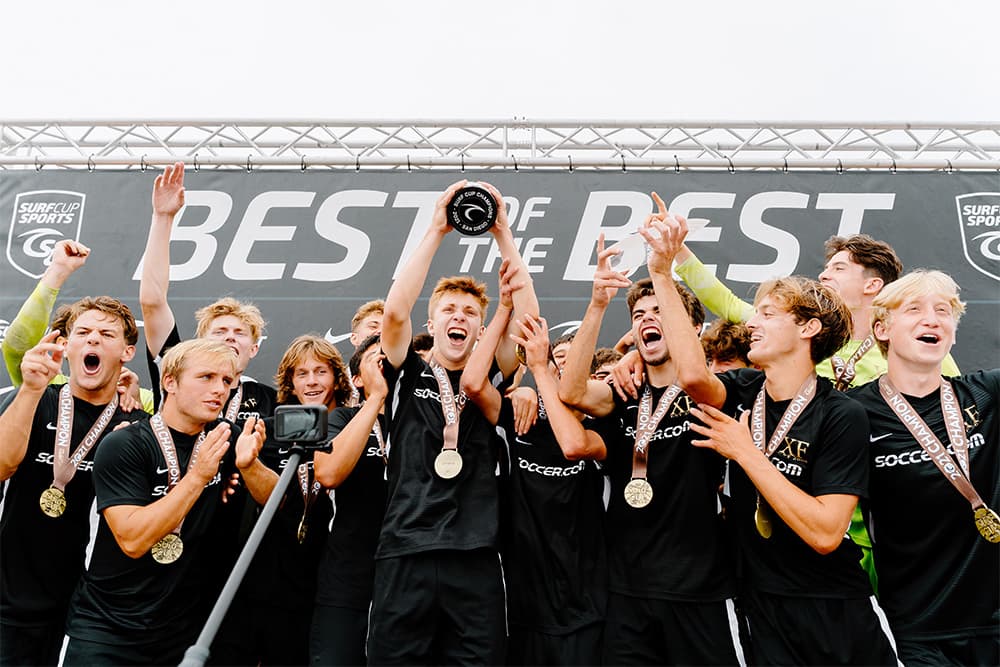 Surf Cup 2021 Champions hoist their trophy.