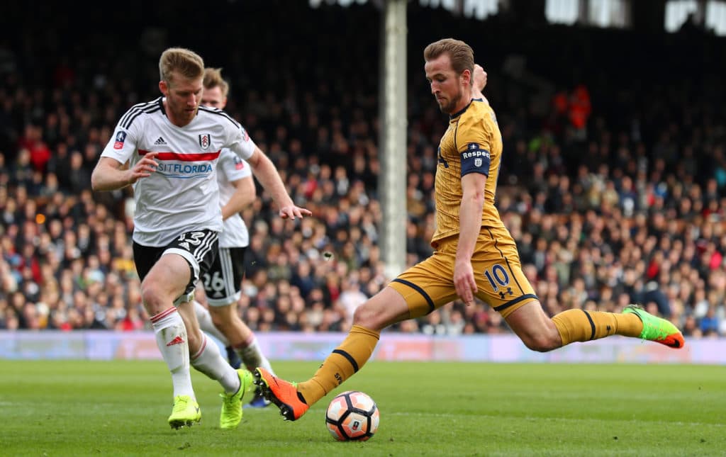 LONDON, ENGLAND - FEBRUARY 19: Harry Kane of Tottenham Hotspur shoots past Tim Ream of Fulham during The Emirates FA Cup Fifth Round match between Fulham and Tottenham Hotspur at Craven Cottage on February 19, 2017 in London, England. (Photo by Clive Rose/Getty Images)