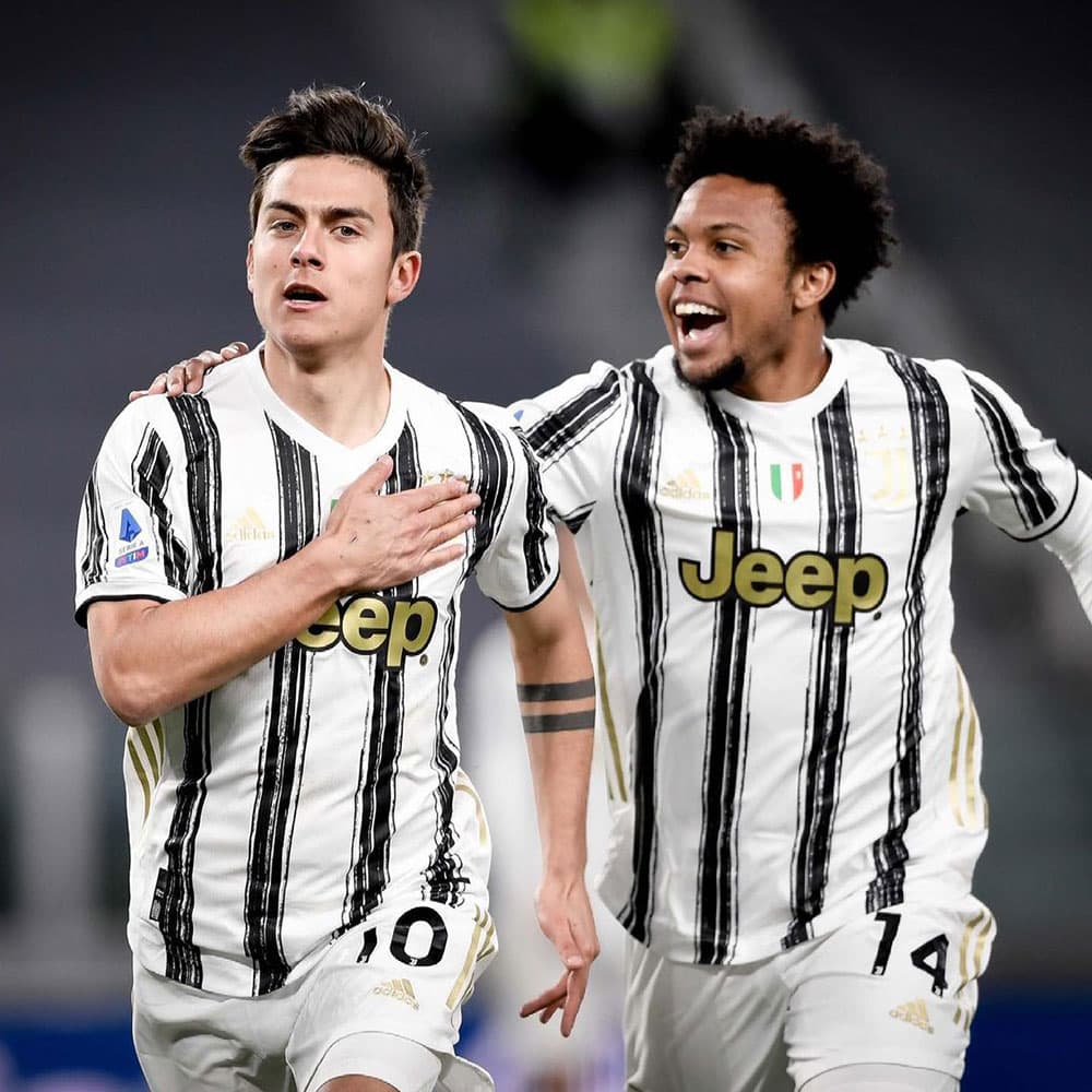 Weston McKennie celebrates with Juventus teammate Paulo Dybala