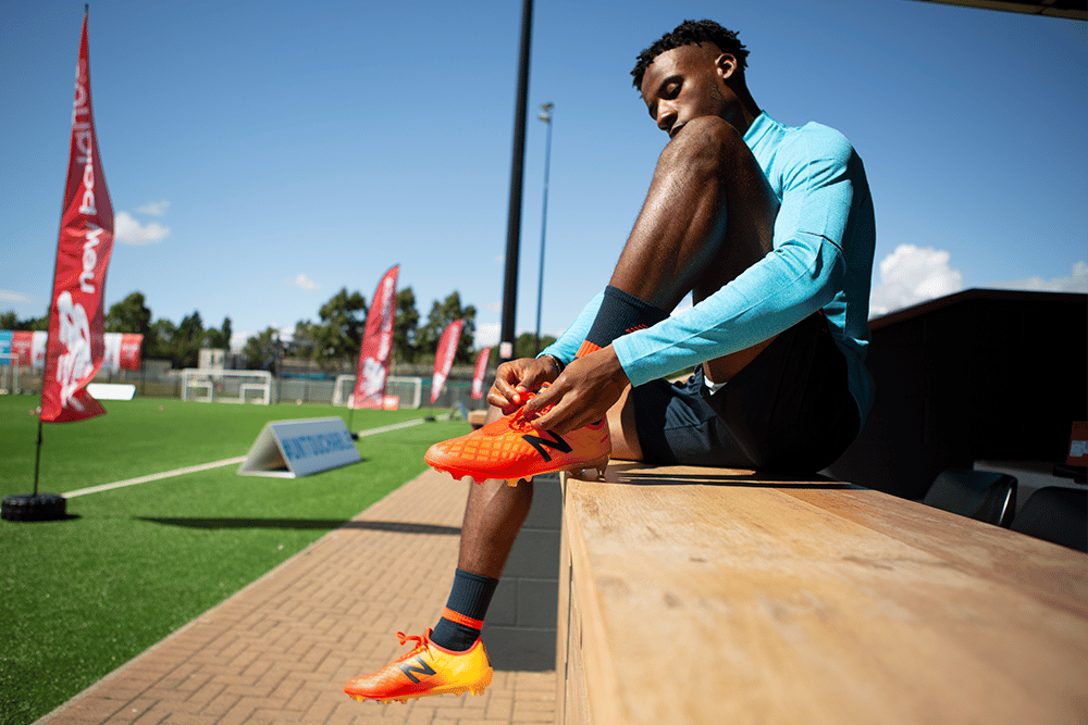 Sadio Mane shows off his New Balance Furon 4.0 at Anfield
