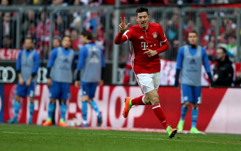 MUNICH, GERMANY - FEBRUARY 25: Robert Lewandowski of FC Bayern Muenchen celebrates after scoring during the Bundesliga match between Bayern Muenchen and Hamburger SV at Allianz Arena on February 25, 2017 in Munich, Germany. (Photo by A. Beier/Getty Images for FC Bayern )