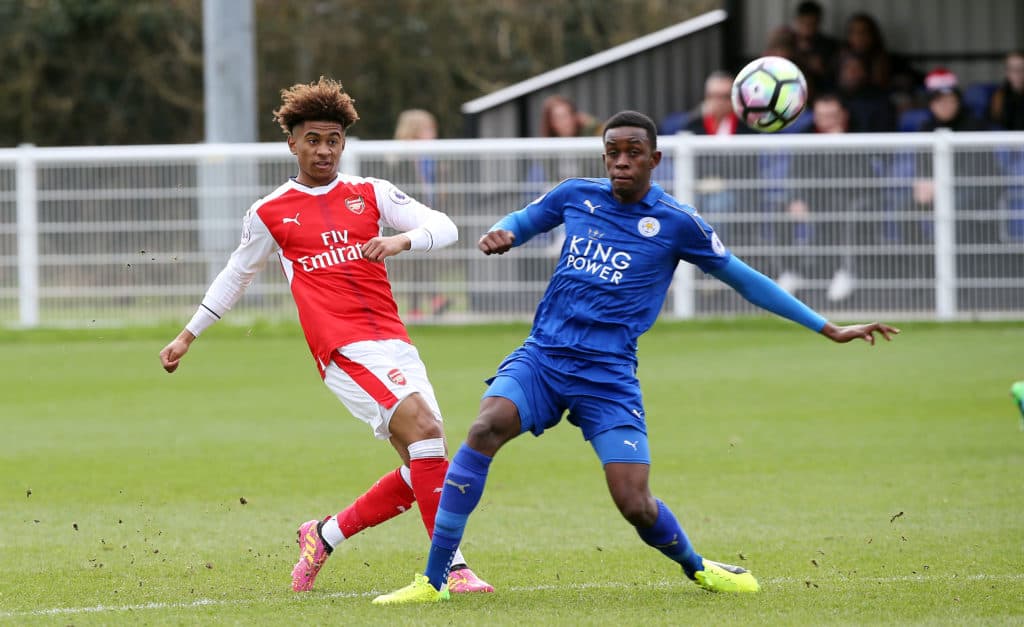 LEICESTER, ENGLAND - February 19: Arsenal's Reiss Nelson under pressure from Leicesters Admiral Muskwe during the Leicester City v Arsenal U23 PL2 match at Holmes Park on February 19 , 2017 in Leicester, United Kingdom. (Photo by Plumb Images/Leicester City FC via Getty Images)