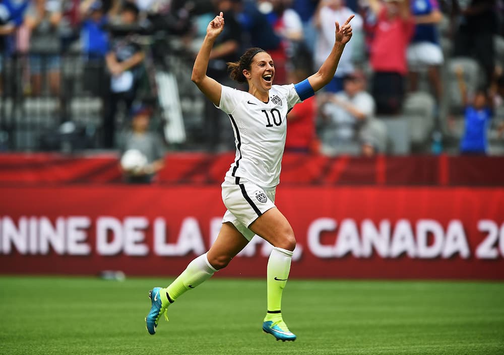 Carli Lloyd celebrates one of her three goals in the 2015 World Cup Final
