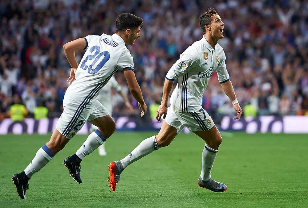 Cristiano Ronaldo celebrates a goal against Sevilla in La Liga.
